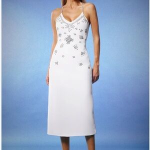 Elegant White Midi Dress with Silver Embellishments